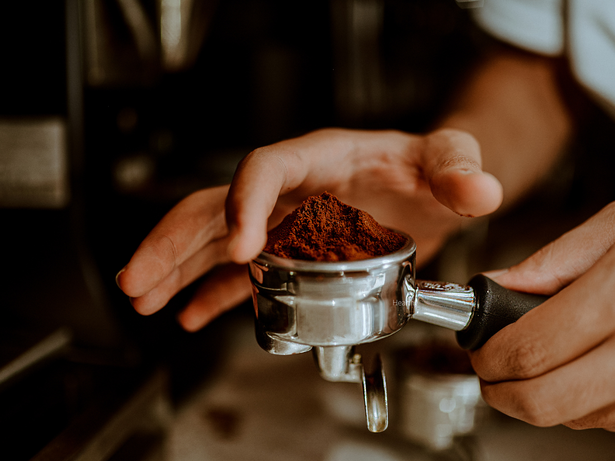 Guy fixing an espresso shot